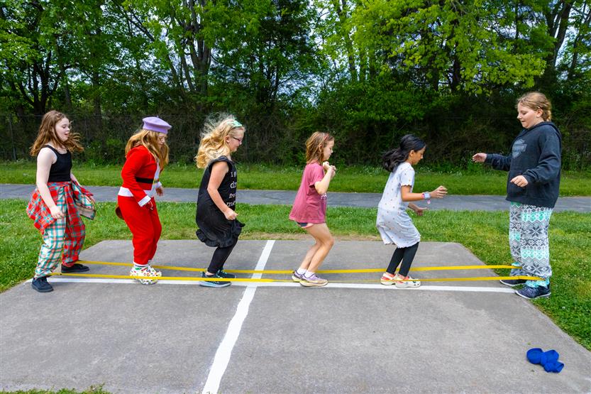Students dance outside